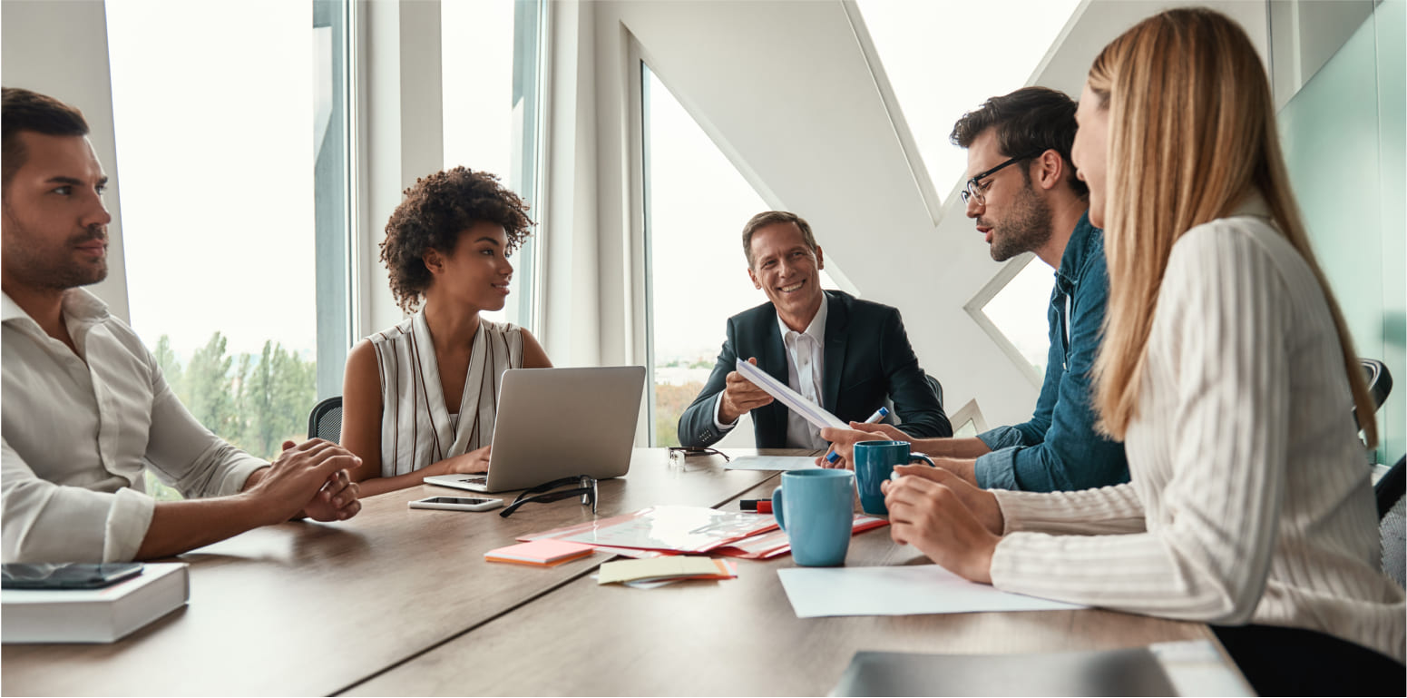 business meeting between five colleaques